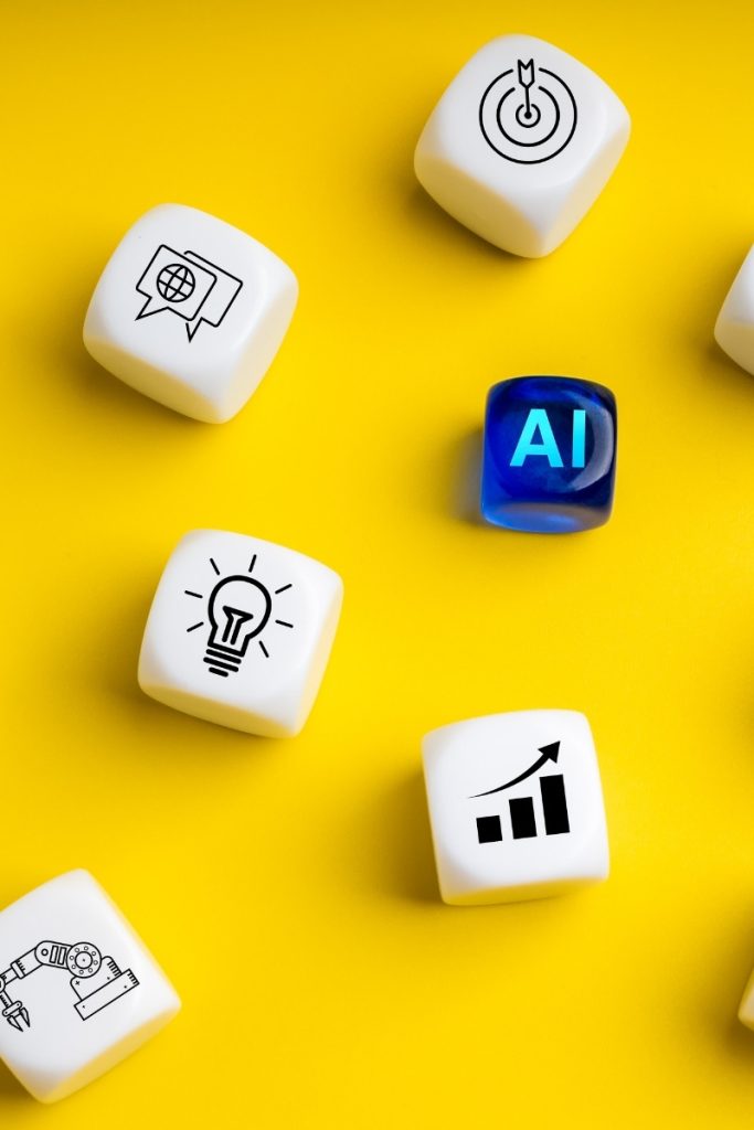 Yellow backdrop with dice showing AI, charts and search symbols