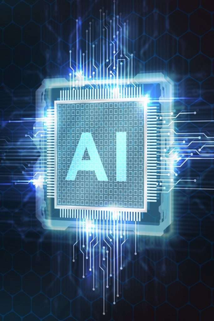 Glowing computer processor marked AI