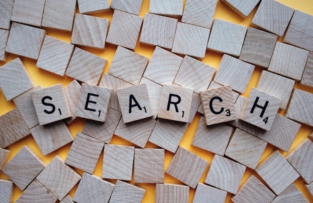 Wooden tiles lined up to read SEARCH